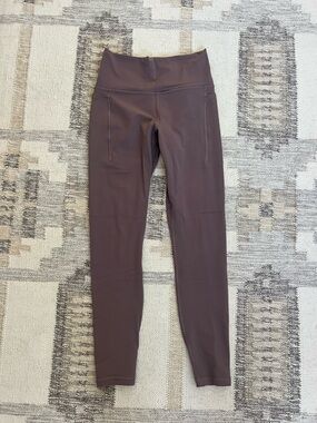 Athleta Transcend Stash Tight
